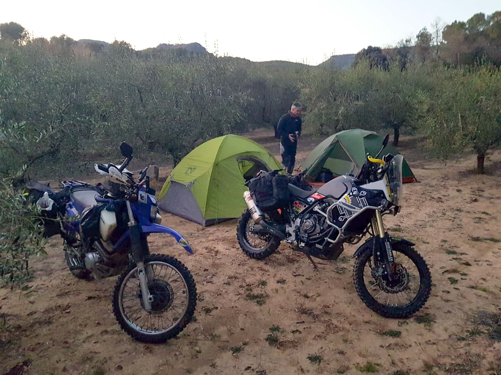 Wild camping on an adventure motorcycle trip using the duffel bags and soft luggage