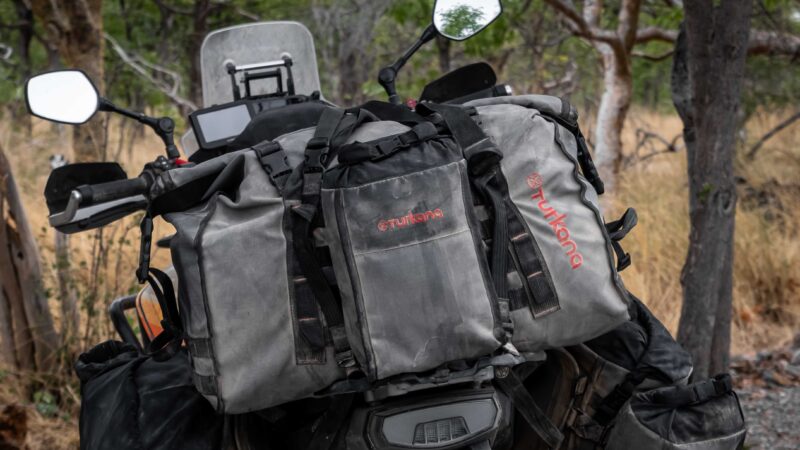 Side profile of the Turkana Duffalo, highlighting its reinforced tie-down points and durable materials built for overland and offroad travel.