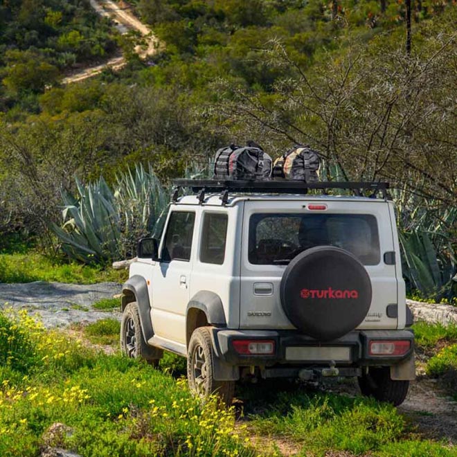 Turkana Duffalo waterproof duffel bag shown packed for a 4x4 travel road trip.