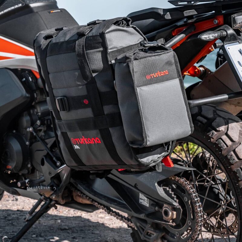Turkana HippoHips soft pannier mounted on KTM Adventure bike with BushBaby bag attached to MOLLE system