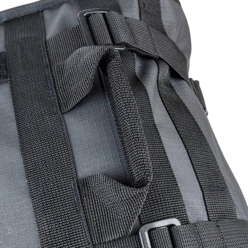 Close-up of compression strap and buckle system on Turkana HippoHips soft motorcycle pannier