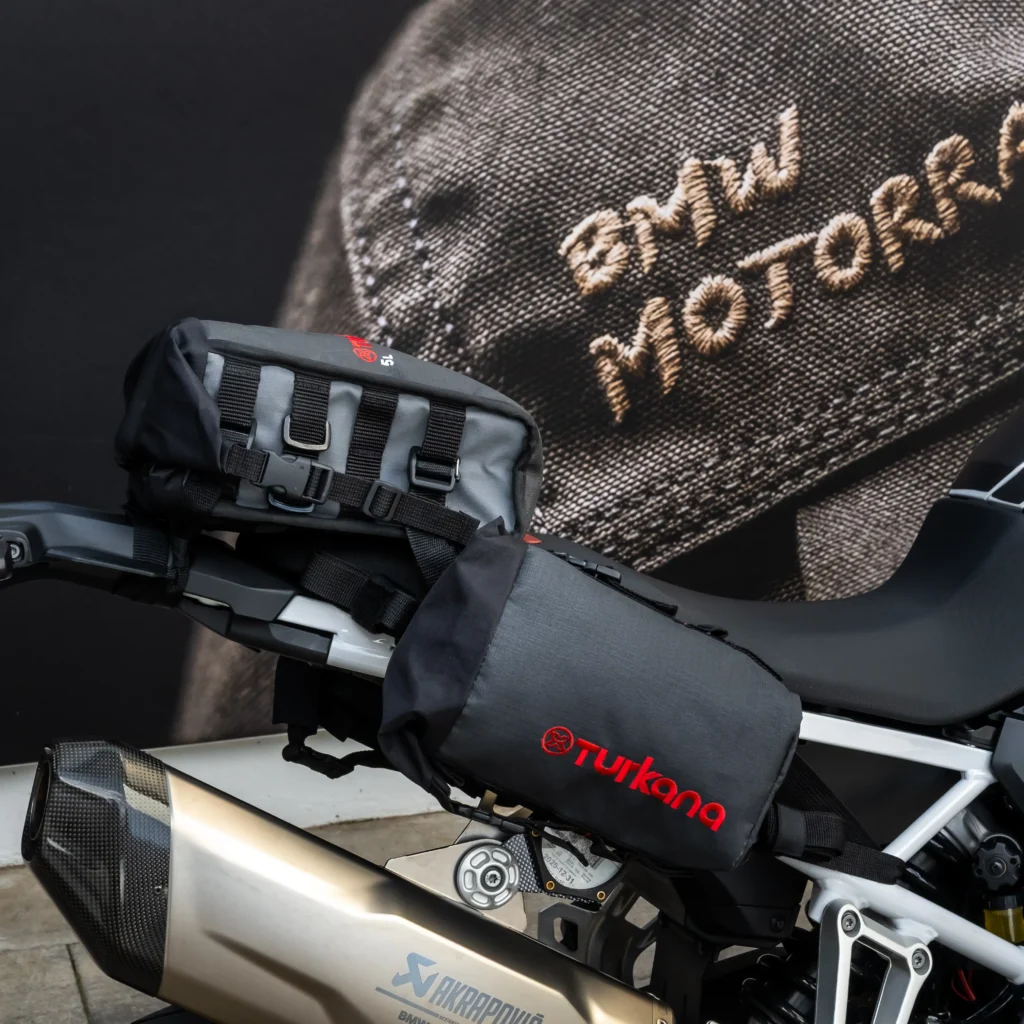 Turkana TrekBags mounted as lightweight motorcycle tail and side luggage on a BMW900GS adventure bike with Akrapovič exhaust.