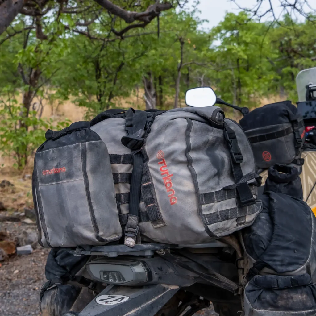 Turkana TrekBags, Duffalo duffel bag and TurtleTrunk luggage mounted on a fully loaded adventure motorcycle during an African overland expedition.