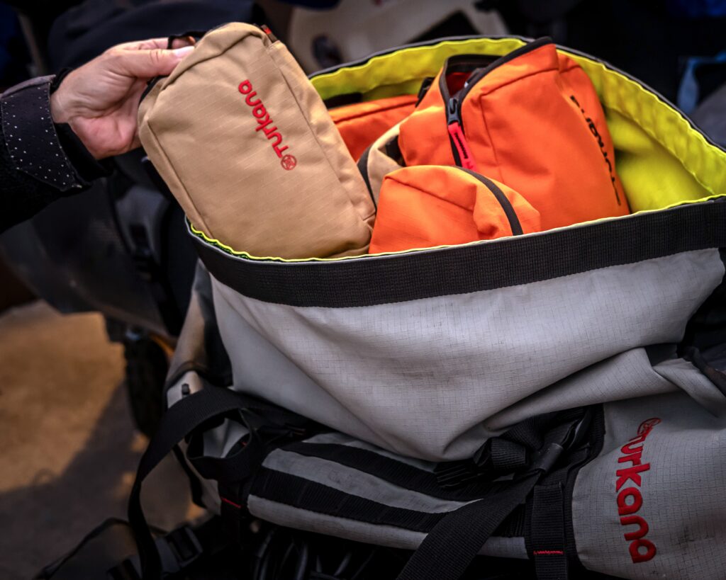 ChipCheeks™ packing cubes are built for years of rugged adventure travel. Constructed from Sharkfur D600™ fabric, a darn tough polyester ripstop abrasion, tears, wear and water-resistant fabric.