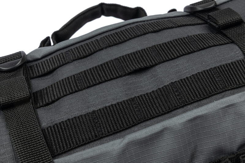 Detail of the TurtleTrunk™ MOLLE webbing system for attaching additional gear or securing the bag to motorcycles, 4x4 roof racks, or adventure setups.