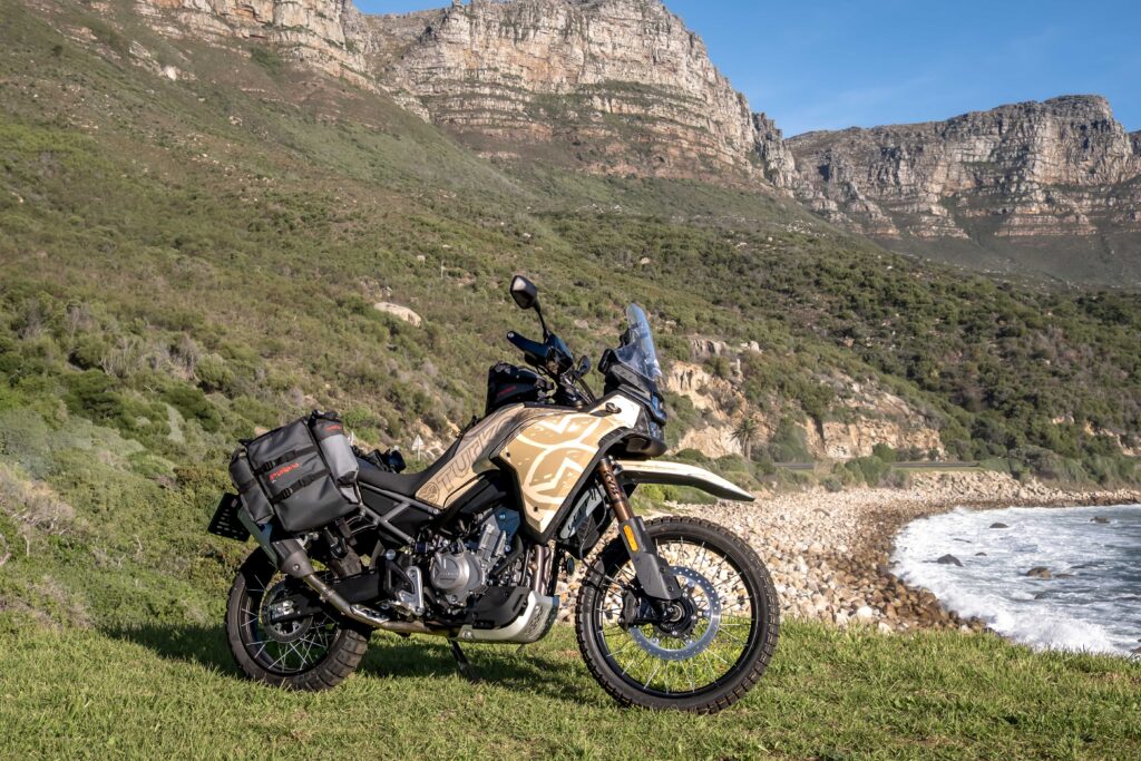 CFMoto 450 with Turkana MadMules and Bullfrog tank bag on dirt trail