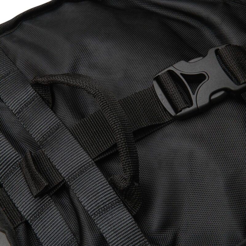 Close-up of Turkana Duffalo duffel bag showing reinforced carry handle, webbing straps, and heavy-duty buckle.