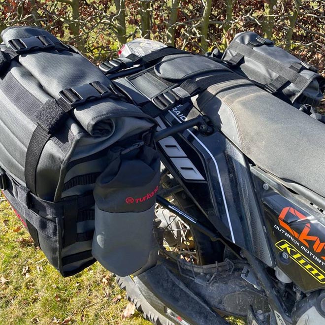 Turkana HippoHips saddlebags mounted using the crossover over-the-seat strap system.