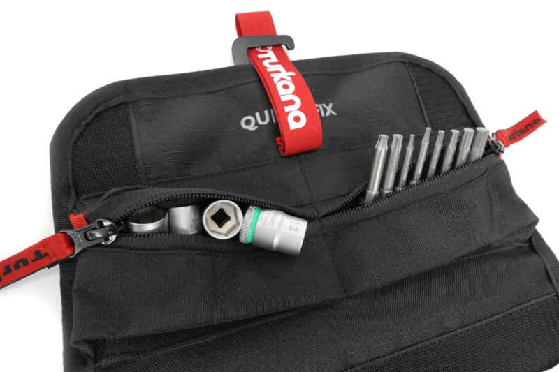 Built for flexibility: the Turkana StowCrow Tool Pouch works as a roll, hang-up organizer, or strapped to racks. Modular pockets and tie-down options mean your tools stay put on any adventure.