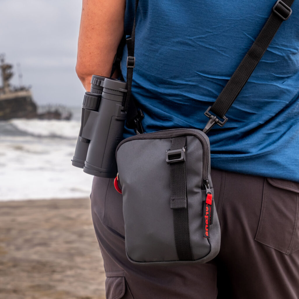 Rear view of the Turkana Sling Thing EDC Sling Thing worn as a crossbody bag. Slim profile, TuskTex500 fabric, oversized zip, and durable hardware designed for travel, hiking, and daily use.