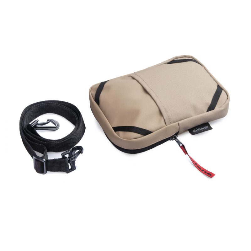 Turkana SlingThing pouch with detachable shoulder strap placed beside the bag.