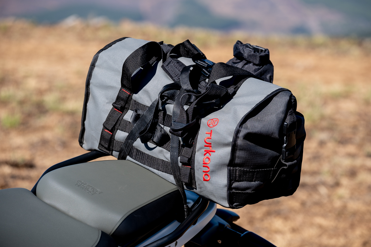 Turkana Gear Duffalo 20L waterproof motorcycle duffel bag mounted on a Royal Enfield Himalayan 450. Lightweight soft luggage solution for adventure motorcycles and dual-sport travel.