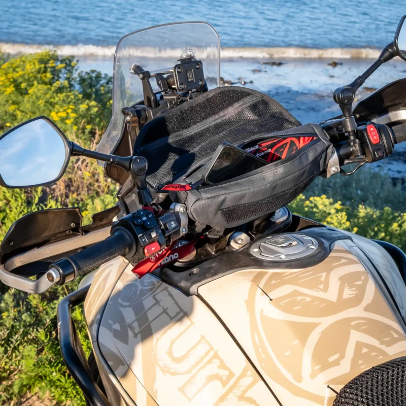 Open PelliPouch Enduro mounted on a motorcycle with a phone stored inside.