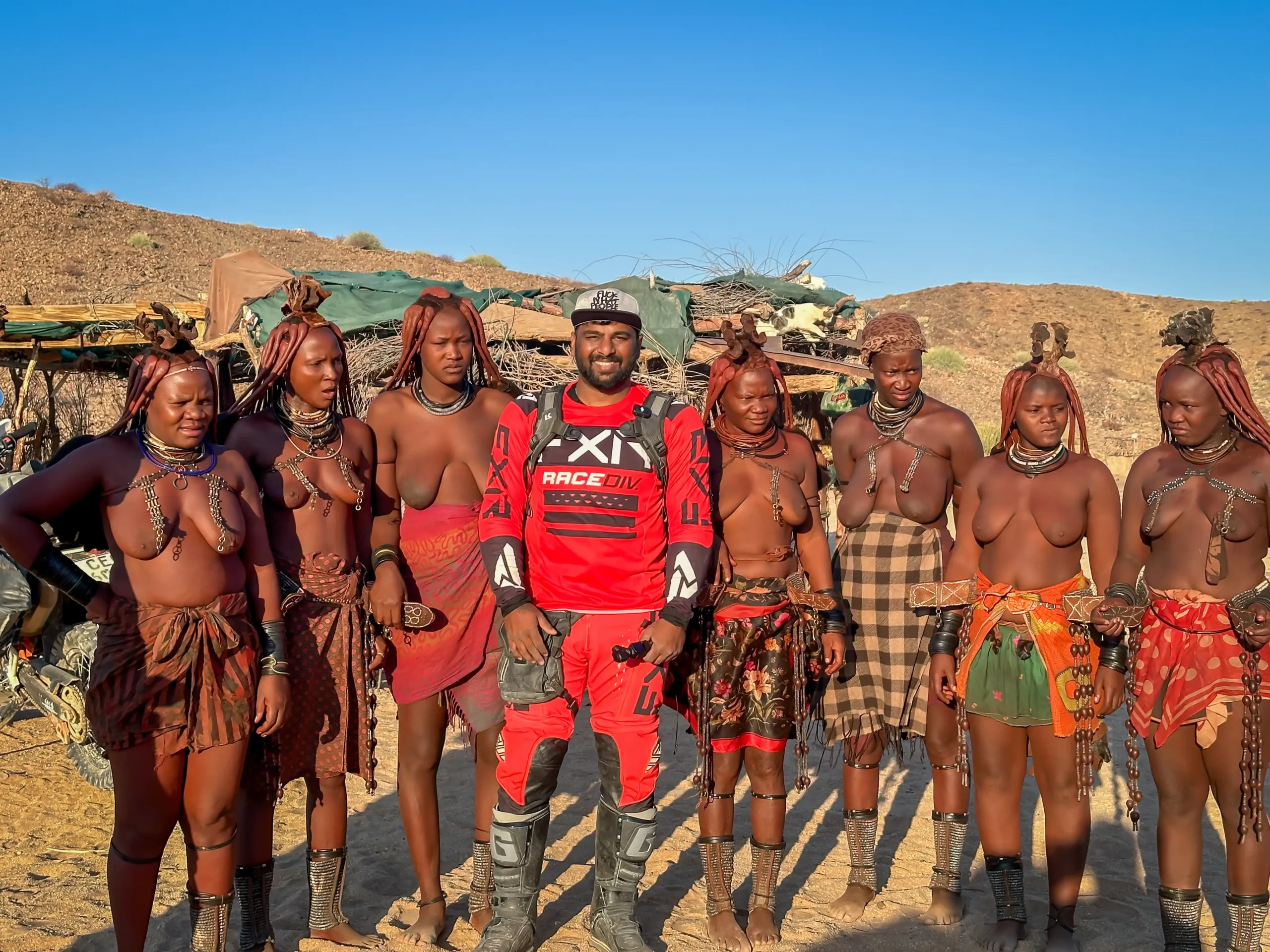 Tagore Sureshbabu meeting Himba people during his motorcycle journey through Namibia
